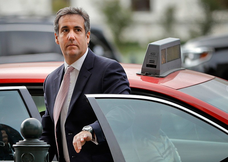 In this Sept. 19, 2017, file photo, Michael Cohen, President Donald Trump's personal attorney, steps out of a cab during his arrival on Capitol Hill in Washington. Cohen won't appear as scheduled before the House Oversight and Reform Committee on Feb. 7, 2019. Cohen's adviser Lanny Davis says the delay is on the advice of Cohen's lawyers because Cohen's still cooperating in special counsel Robert Mueller's Russia investigation. (AP Photo/Pablo Martinez Monsivais, file)