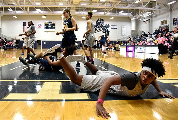 Lincoln guard Kiara Shoulders looks toward the referee after being fouled during Saturday afternoon's game against Central Oklahoma at Jason Gym.