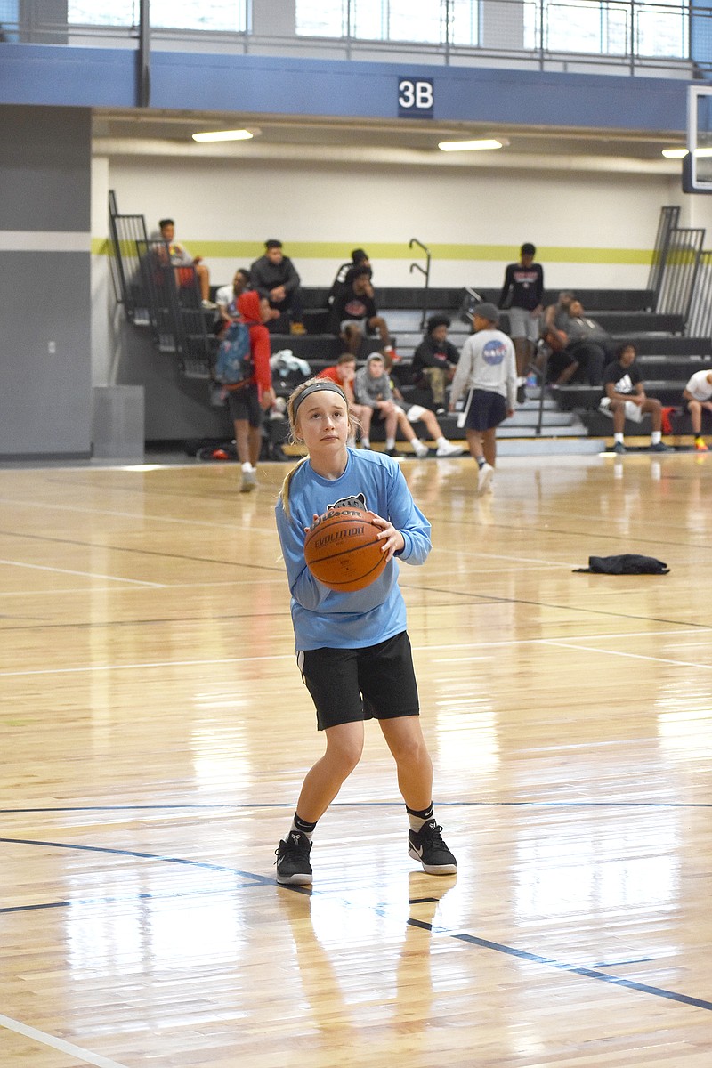 Charlee Bailey, 11, practices before 2019's NBA Skills Challenge at The LINC. Her older brother, Jackson, placed second in the national competition two years prior.