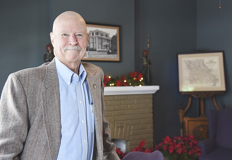 Terry Ehrsam poses in the westside Jefferson City office of Friends of the Missouri Governor Mansion, where Ehrsam has long been a doscent and before that served as mansion security while on the Capitol Police Force.