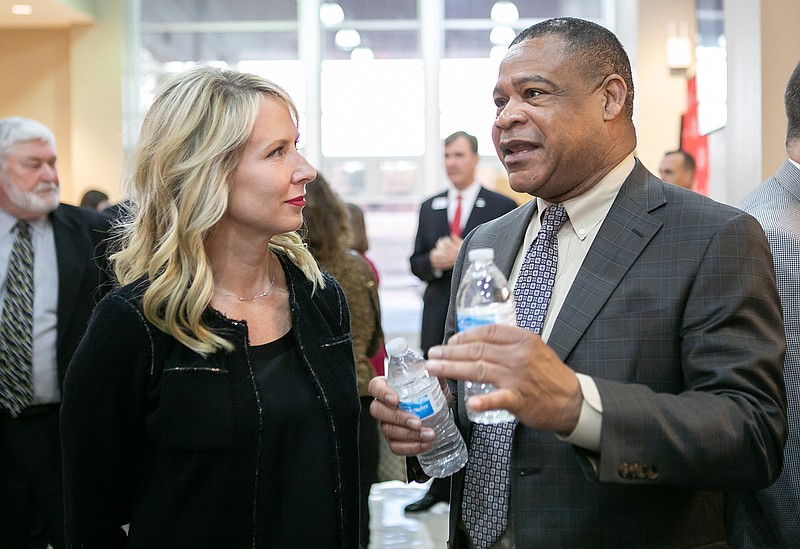 Arkansas Justice Courtney Goodson and Miller County Circuit Judge Carlton Jones talk Tuesday at the University of Arkansas Hope-Texarkana.