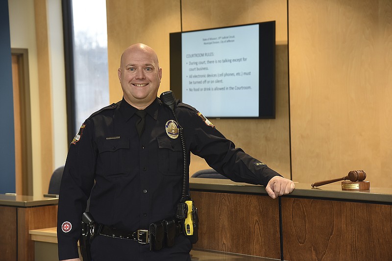 Julie Smith/ News Tribune
Officer Patrick Duncan poses Wednesday in Jefferson City Municipal Court. Duncan was recently name Jefferson City employee of the month.
