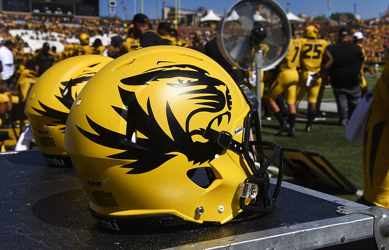 In this Sept. 22, 2018, file photo, a Missouri football helmet sits on the bench during the second half of an NCAA college football game against Georgia in Columbia, Mo. 