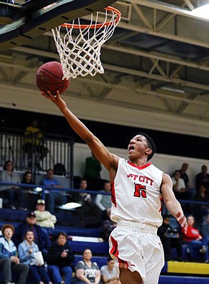 Jefferson City's Sterling DeSha goes up for a layup during Saturday's game against Cardinal Ritter in the Central Bank Shootout at Rackers Fieldhouse.