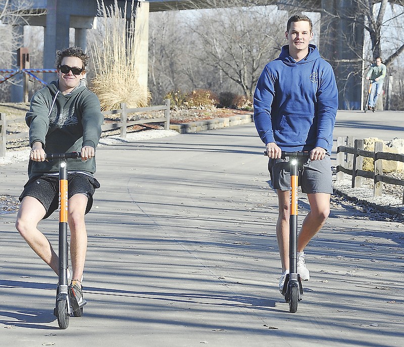 Jefferson City High School friends Jacob Wells, left, Gunnar See spent an afternoon in early January 2019 riding Spin scooters around town and Wilson's Serenity Point at Noren Access. 