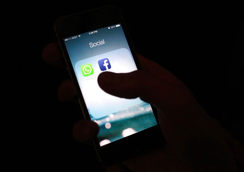 
The Facebook app icon is shown on an iPhone on Feb. 19, 2014, in  New York. Apple says it has banned a Facebook-made app that paid users, including teenagers, to extensively track their data. The app, Facebook Research, tracked people's phone and web activity in exchange for payments. 

