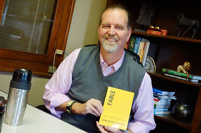 New author Dr. John David Long is an associate professor of education and the chair of Doctoral Studies at William Woods University. "FABLE" offers career guidance told in allegorical form and is available at amazon.com.