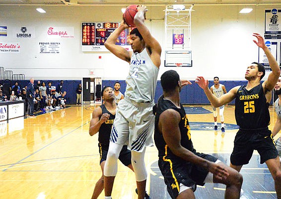 Terrance Smith of Lincoln pulls down a rebound during Thursday night's game against Missouri Western at Jason Gym.