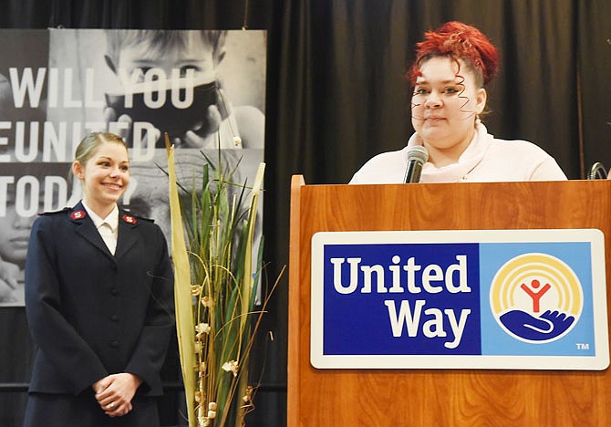 Rachael Stephens talks about her struggles and how, with the help of The Salvation Army's Center of Hope, she's now in a stable relationship, has a job and her own residence. Standing in the background is Lt. Rachel White of the Center of Hope.