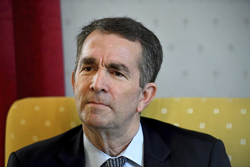 Virginia Gov. Ralph Northam talks during an interview at the Governor's Mansion, Saturday, Feb. 9, 2019 in Richmond, Va. The embattled governor says he wants to spend the remaining three years of his term pursuing racial "equity." Northam told The Washington Post that there is a higher reason for the "horrific" reckoning over a racist photograph that appeared in his medical school yearbook. (Katherine Frey/The Washington Post via AP)