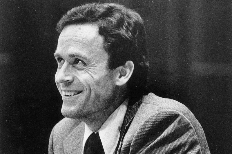FILE - In this June 27, 1979 file photo, Ted Bundy smiles during the second day of jury selection for his murder trial in a Dade County courtroom in Miami, Fla. Bundy is being tried for the murders of two women in Tallahassee on Jan. 15, 1978. (AP Photo)