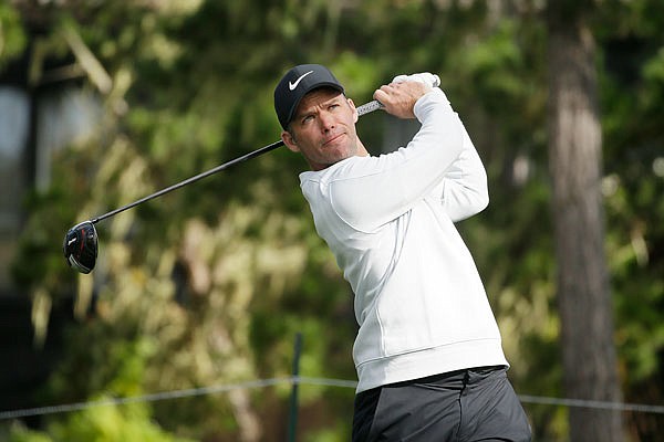 Paul Casey watches his drive on the 18th hole of the Spyglass Hill Golf Course during Saturday's third round of the Pebble Beach Pro-Am in Pebble Beach, Calif.