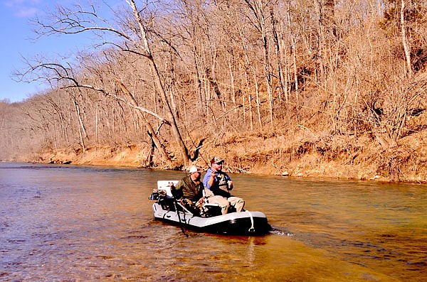 Damon Spurgeon of Cardiac Mountain Outfitters guides Brandon Butler on the Meramec River.