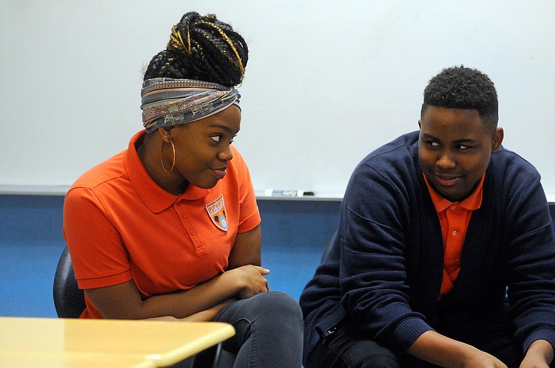 In this Nov. 15, 2018 photo, students participate in a Youth Aware of Mental Health session at Uplift Hampton Preparatory School in Dallas. University of Texas Southwestern Medical Center offers the program to schools to help educate students about mental health and suicide prevention. Part of the program includes the students participating in role-playing sessions to help them understand the issues being discussed. (AP Photo/Benny Snyder)