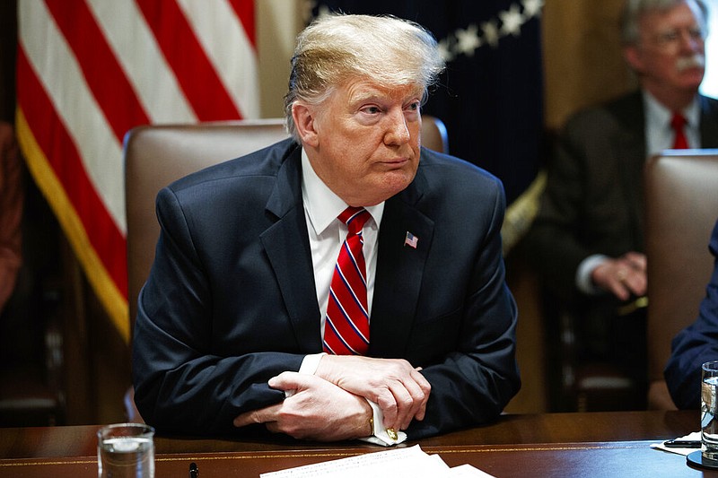 President Donald Trump listens to a question during a cabinet meeting at the White House, Tuesday, Feb. 12, 2019, in Washington. 