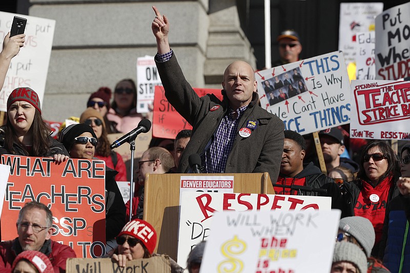 Ron Ruggiero, president of the Service Employees International Union Local 105, speaks to striking Denver teachers during a strike rally on the west steps of the State Capitol Monday, Feb. 11, 2019, in Denver. The strike is the first for teachers in Denver since 1994 and centers on base pay. (AP Photo/David Zalubowski)
