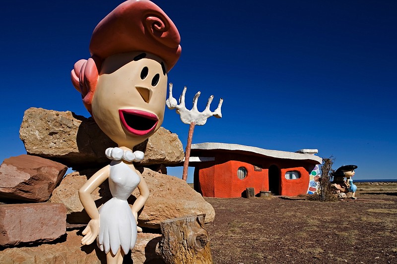FILE - In this Nov. 11, 2008, file photo, provided by Richard Maack, a Wilma Flintstone figure is seen at the Flintstones Bedrock City theme park near Williams, Ariz. The theme park near the Grand Canyon designed around the "Flintstones" cartoon will now be strictly for the birds. The new owner says it will become Raptor Ranch: Birds of Prey park, a showcase for falconry. The Arizona Daily Sun reported on the sale this week. (Richard Maack via AP, File)
