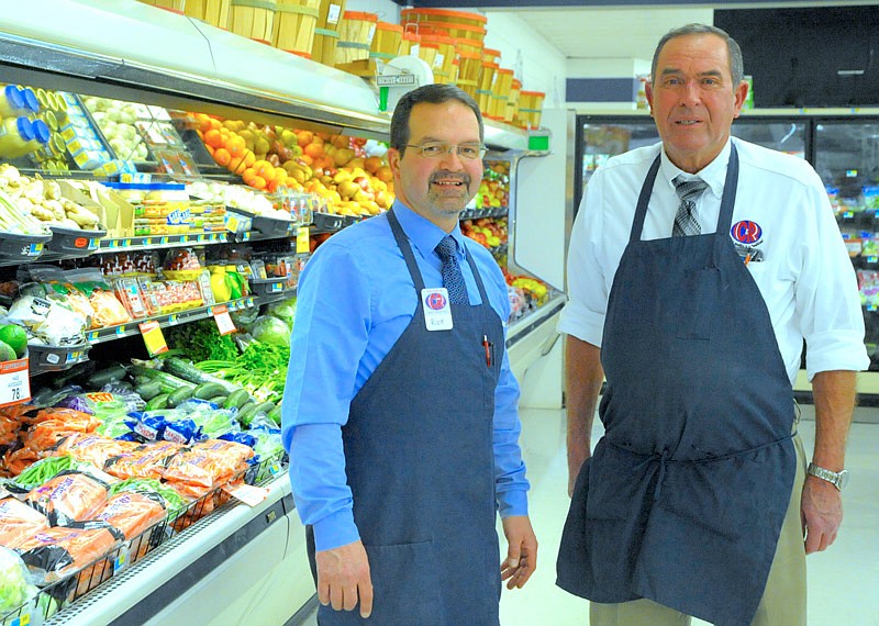 Democrat photo/Michelle Brooks

C&R Market Manager Rick Winter, left, took over store responsibilities last month from Kenny Pessetto, who will continue to work there part-time.