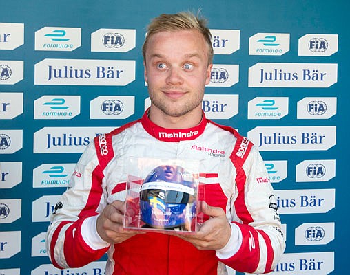 This July 30, 2017, file photo, shows Felix Rosenqvist holding his trophy for winning the pole position at the Montreal Formula ePrix electric car race in Montreal. Rosenqvist will race in the IndyCar Series this season.