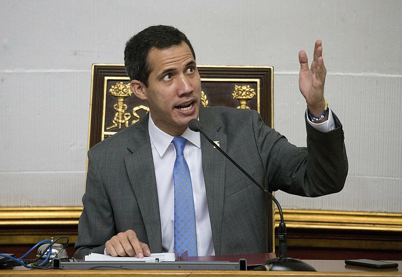 Venezuela' self proclaimed interim president and President of the National Assembly Juan Guaido, speaks during a session at the National Assembly, in Caracas, Venezuela, Wednesday, Feb. 13, 2019. Guaido said Wednesday that the National Assembly has appointed six executives to a transitional board for its PDVSA state-owned oil company and its U.S. subsidiaries, including Houston-based refiner Citgo. (AP Photo/Ariana Cubillos)