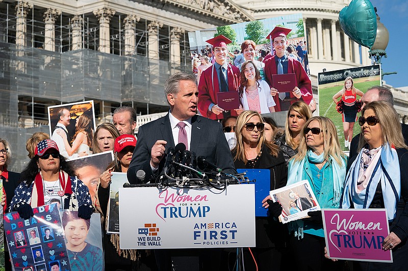 House Minority Leader Kevin McCarthy, R-Calif., joins supporters of President Donald Trump and family members of Americans killed by undocumented immigrants as they gather to to promote their support for a border wall with Mexico, at the Capitol in Washington, Wednesday, Feb. 13, 2019. (AP Photo/J. Scott Applewhite)