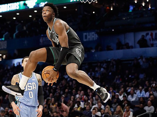 OG Anunoby of the World team leaps toward the basket during Friday night's NBA All-Star Rising Stars game against the U.S. team in Charlotte, N.C. Anunoby, a former Jefferson City Jay, totaled 12 points as the World fell 161-144 to the U.S.