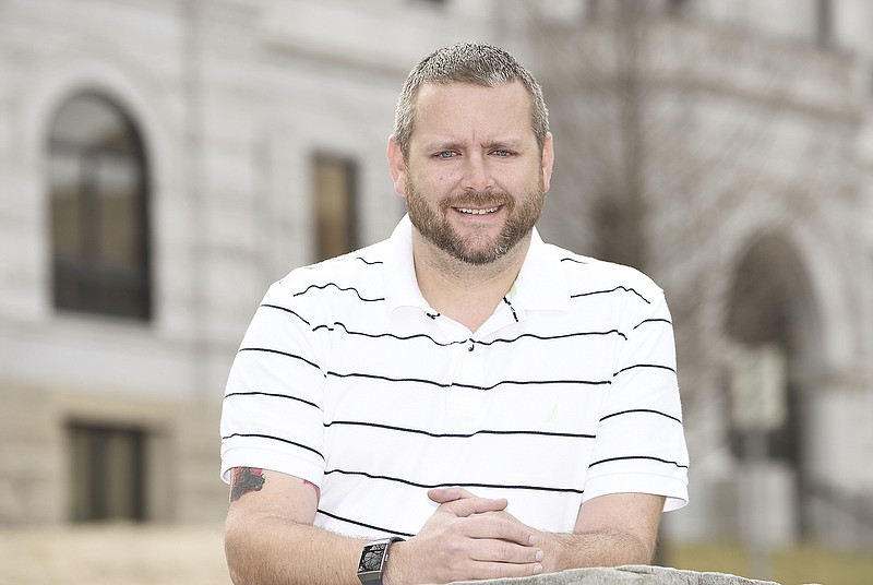 Adam Koestner poses outside of the News Tribune. Koestner, who works for the Department of Corrections, will be participating in this year's Super Plunge and Polar Plunge to benefit Special Olympics Missouri. 