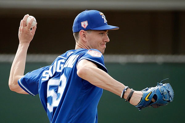 Royals pitcher Eric Skoglund throws during spring training Friday in Surprise, Ariz.