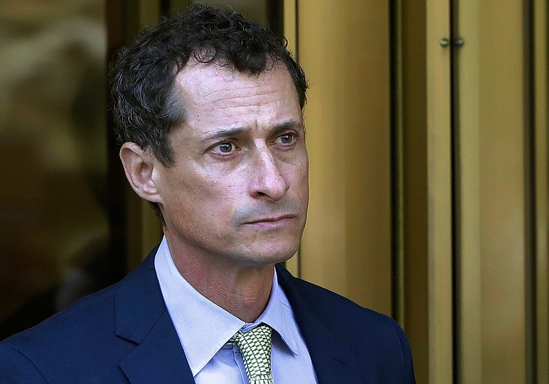 In this Sept. 25, 2017, file photo, former Congressman Anthony Weiner leaves federal court following his sentencing in New York. Weiner has been released from federal prison in Massachusetts. The New York Democrat, a once-rising star who also ran for mayor, was convicted of having illicit online contact with a 15-year-old North Carolina girl in 2017. The Federal Bureau of Prisons website now shows Weiner is in the custody of its Residential Re-entry Management office in Brooklyn, New York. It's not immediately clear when he was transferred and where he's currently staying. The bureau, federal court in New York and Weiner's lawyer didn't immediately comment. (AP Photo/Mark Lennihan, File)