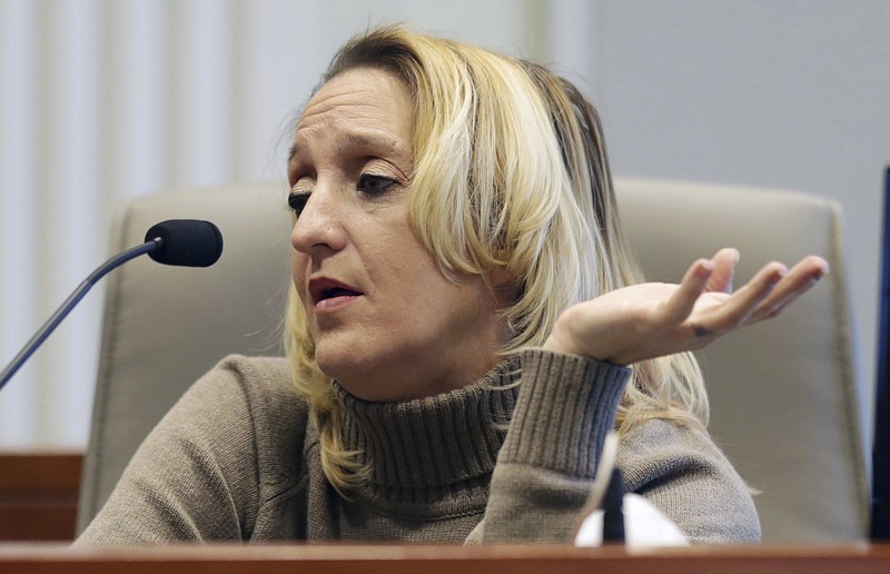 Lisa Britt answers a question by executive director of the Board of Elections Kim Strach during the public evidentiary hearing on the 9th Congressional District investigation Monday, Feb. 18, 2019, at the North Carolina State Bar in Raleigh, N.C. (Juli Leonard/The News & Observer via AP, Pool)