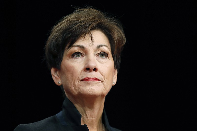 FILE - In this Jan. 18, 2018, file photo, Iowa Gov. Kim Reynolds delivers her inaugural address in Des Moines, Iowa. Reynolds said Monday, Feb. 18, 2019, she decided against appealing a judge's ruling last month that struck down Iowa's "fetal heartbeat" abortion law, which would have been the most restrictive anti-abortion law in the nation. (AP Photo/Charlie Neibergall, File)