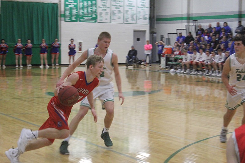 Jordon Geiser gets past a defender during California's 88-58 loss to Blair Oaks on Feb. 12, 2019.