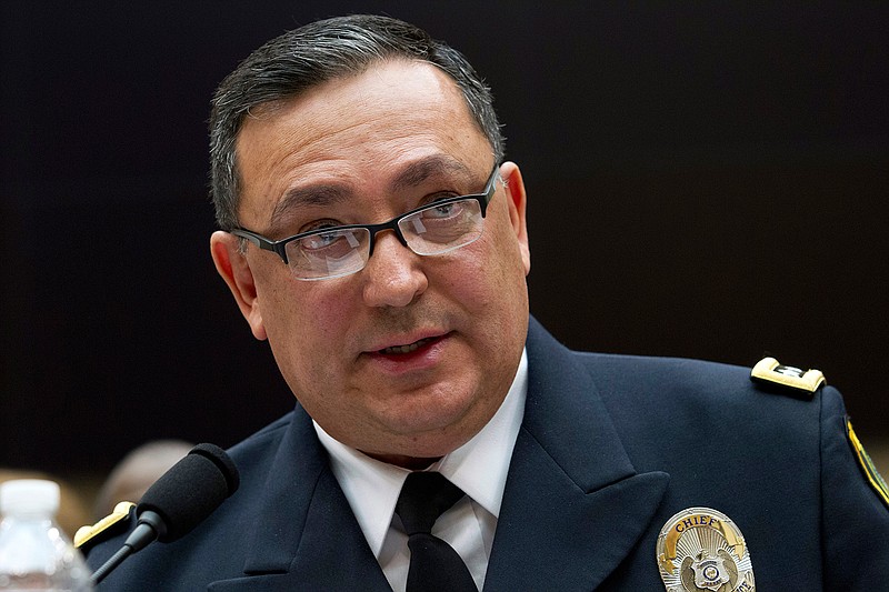 In this Feb. 6, 2019 file photo, Houston Police Department chief Art Acevedo testifies before the House Judiciary Committee hearing on gun violence, at Capitol Hill in Washington. The police chief announced on Monday, Feb. 18 that the Houston Police Department will end its use no-knock warrants, just weeks after a drug raid on a home in which two suspects were fatally shot and five undercover officers were injured.  Acevedo said officers will need to receive a special exemption from his office to conduct a no-knock raid. (AP Photo/Jose Luis Magana, File)
