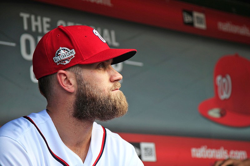 Bryce Harper is one of several free agents still unsigned as spring training games begin. 