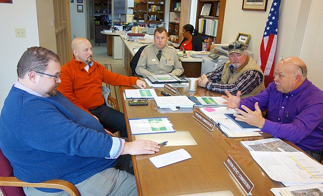 MOCANNA co-owners John Gaddy, left, and Jerry Proctol met with county officials including Sheriff Clay Chism and commissioners Randy Kleindienst and Gary Jungermann on Wednesday. MOCANNA hopes to establish a marijuana cultivation facility in the Mid-Missouri area.