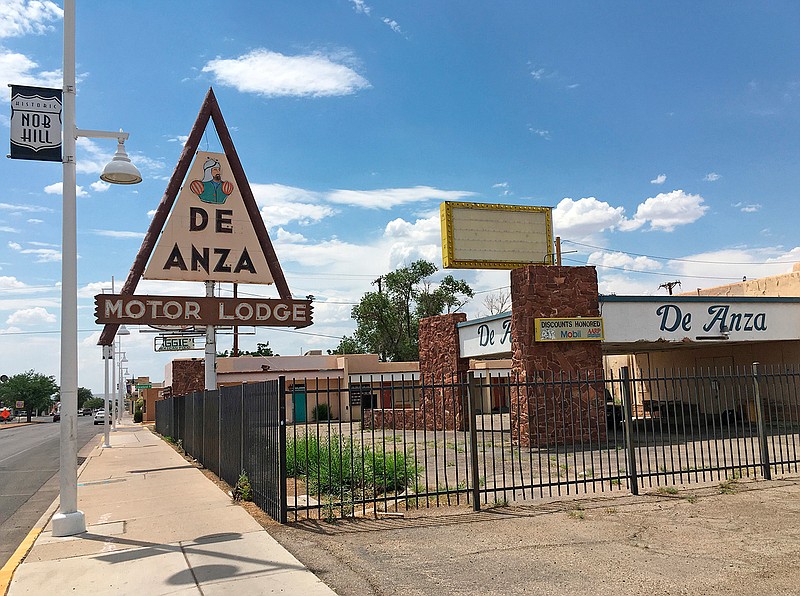 In this June 24, 2016, file photo, the closed De Anza Motor Lodge sits along Route 66 in Albuquerque, N.M., and recently has been highlighted as one of the few places that allowed black travelers to stay during segregated times. " The Oscar-nominated interracial road trip movie "Green Book" has spurred interest in the 20th Century guidebook that helped black travelers navigate segregated America. (AP Photo/Russell Contreras, File)