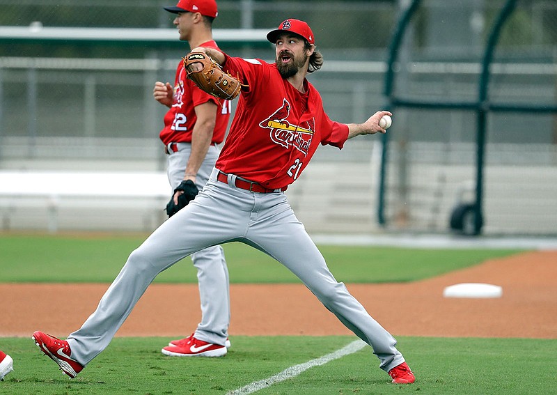 Cardinals pitcher Andrew Miller throws during spring training practice Wednesday in Jupiter, Fla.