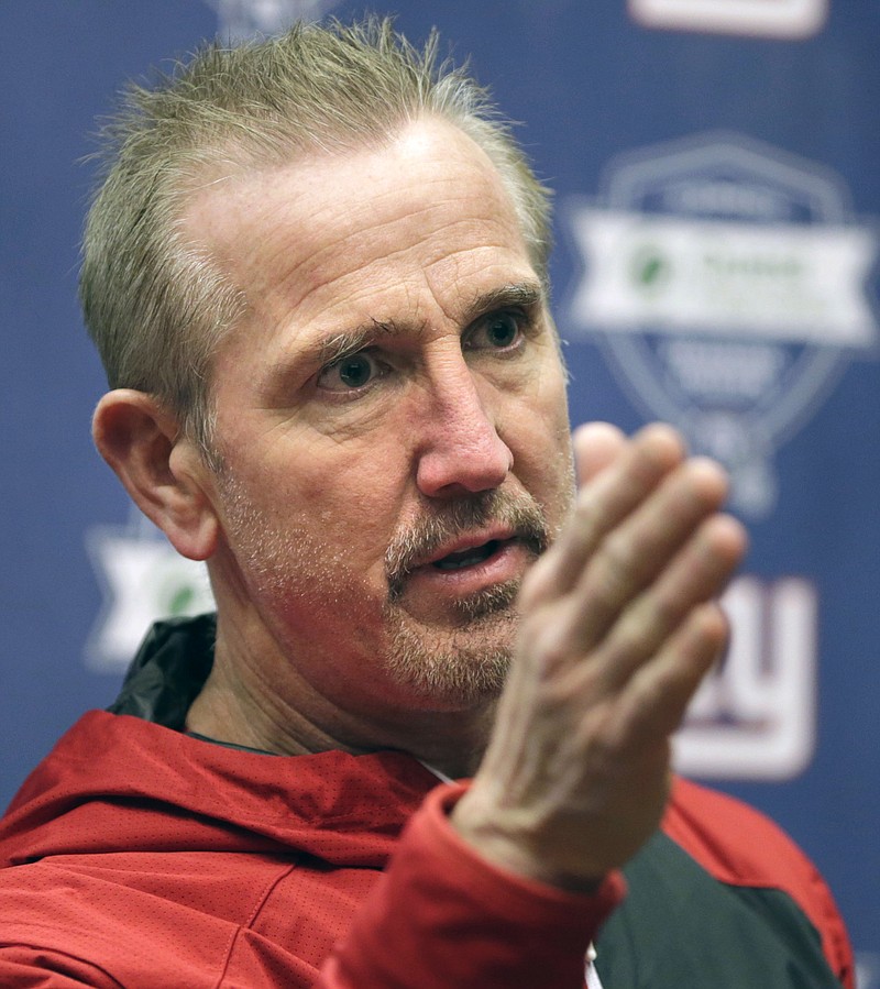 In this Jan. 5, 2017, file photo, New York Giants defensive coordinator Steve Spagnuolo talks to reporters in East Rutherford, N.J. The Kansas City Chiefs have turned to Spagnuolo to shore up their soft defense, and the former Rams and Giants head coach knows that it will be a process. But he also said Wednesday, Feb. 20, 2019, that there are pieces in place for a rapid turnaround. (AP Photo/Seth Wenig, File)