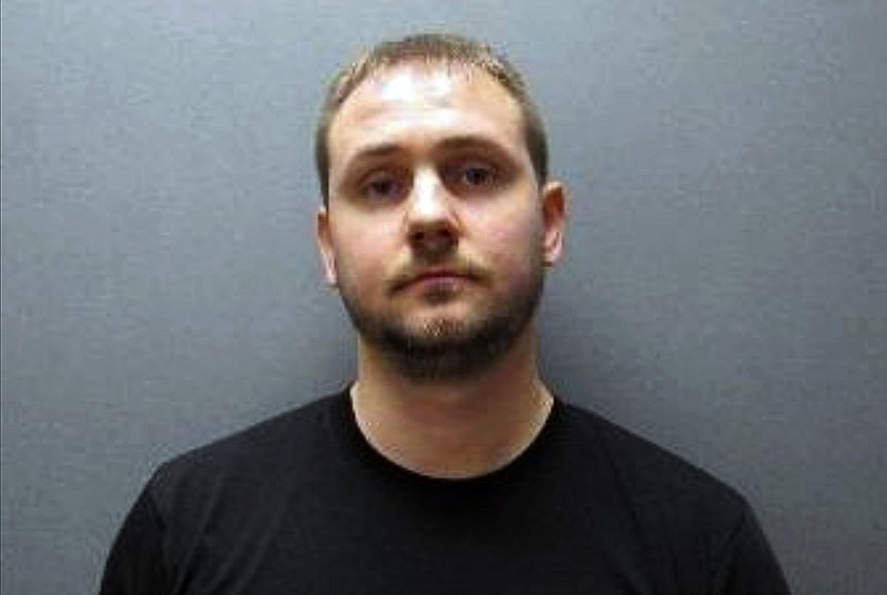 This undated booking photo released by Johnson County Sheriff's Office shows Nicholas Bridgmon. The Nebraska sheriff's deputy charged with sexually assaulting a woman more than a decade ago now is linked to at least five other victims before he joined the department in 2015. Court records tie Bridgmon, a Seward County deputy, to the additional women but he hasn't yet been charged in those cases. The investigation began when a polygraph test administered by another department he was seeking to join showed deception on his part. (Johnson County Sheriff's Office via AP)