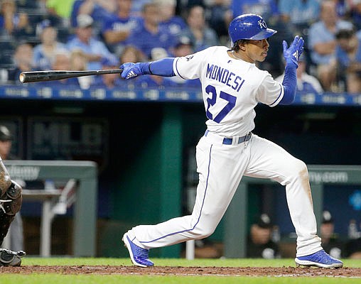 Adalberto Mondesi hits an RBI single during the fifth inning of a game last season against the White Sox at Kauffman Stadium.