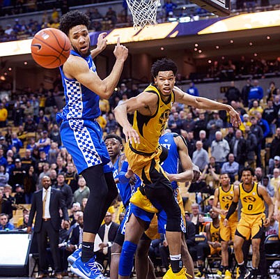 Ronnie Suggs of Missouri and Kentucky's EJ Montgomery watch a ball go out of bounds during the second half of Tuesday night's game at Mizzou Arena.