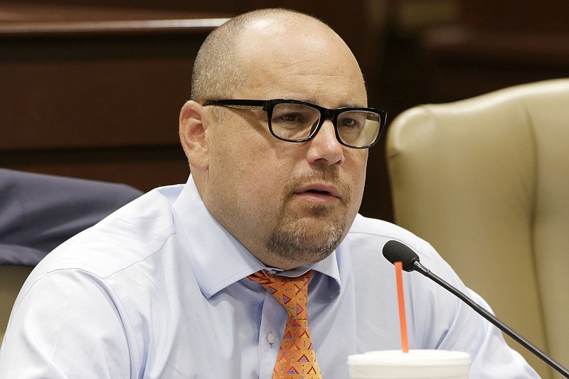 FILE - In this Aug. 18, 2015 file photo, state Sen. Jeremy Hutchinson, R-Benton, speaks at a legislative subcommittee meeting at the state Capitol in Little Rock, Ark.  Jeremy Hutchinson resigned  after he was charged with misspending campaign funds on things like gym memberships and a Netflix subscription. He has pleaded not guilty and is seeking to have the charges dismissed. (AP Photo/Danny Johnston, File)