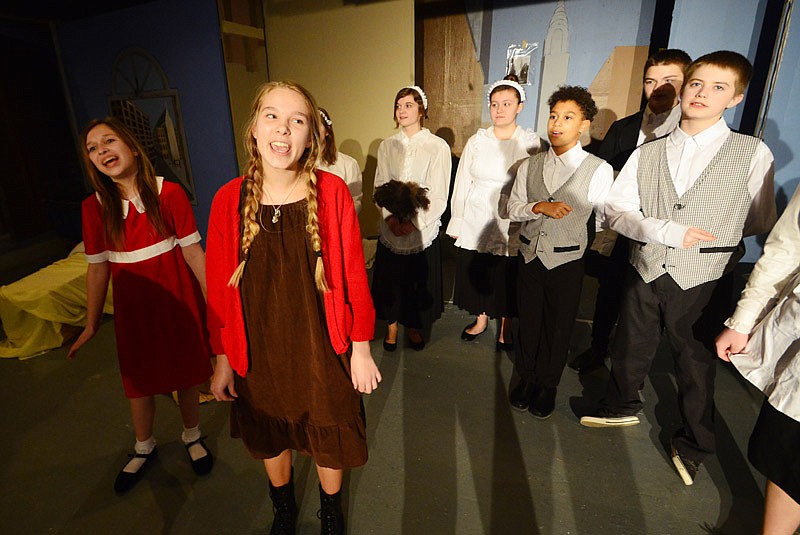 Rachel Chaney (Annie #2) and other actors rehearse for "Annie Jr." at the Stained Glass Theater Tuesday, Feb. 26, 2019. In partnership with Lighthouse Preparatory Academy, the theatre will present "Annie Jr." March 7-9 and 14-16. 