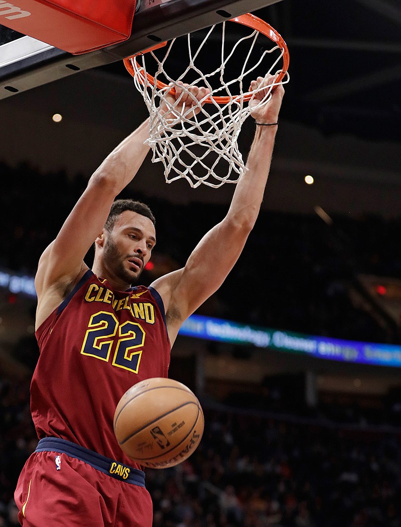 Cleveland Cavaliers' Larry Nance Jr. dunks against the Orlando Magic on Sunday in the first half of an NBA game in Cleveland.