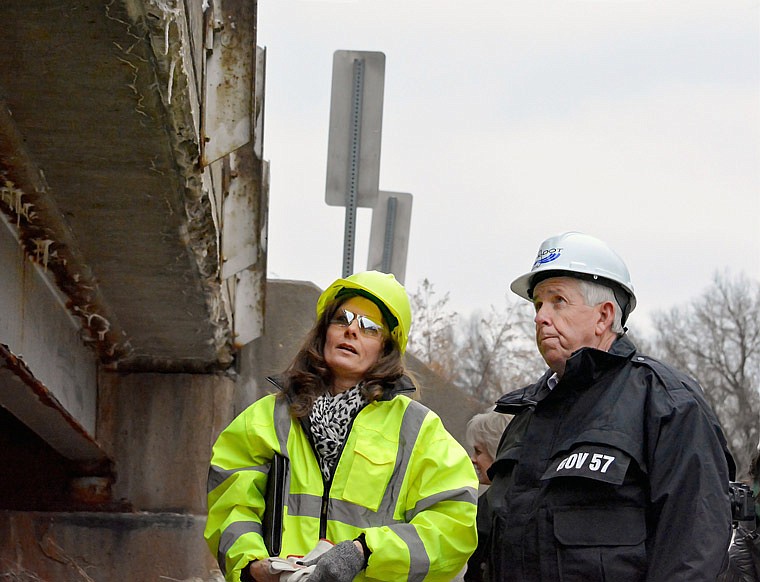 Missouri Gov. Mike Parson takes a look Thursday, Feb. 28, 2019, under the Route H bridge over Bois Brule Creek, located about 3.5 miles south of Brazito. The bridge is listed to be part of a program to repair or replace 250 of Missouri's deficient bridges that Parson proposed during his 2019 State of the State address.