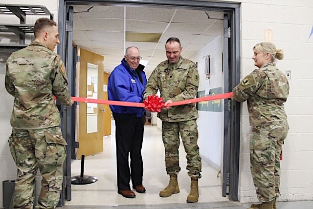 Fulton Mayor LeRoy Benton and Lt. Col. Jason Maeder, the Battalion Commander for the 229th Multifunctional Medical Battalion, cut the ribbon at the end of the ceremony welcoming them to Fulton. The battalion moved into the Fulton Armory effective Jan. 1. 