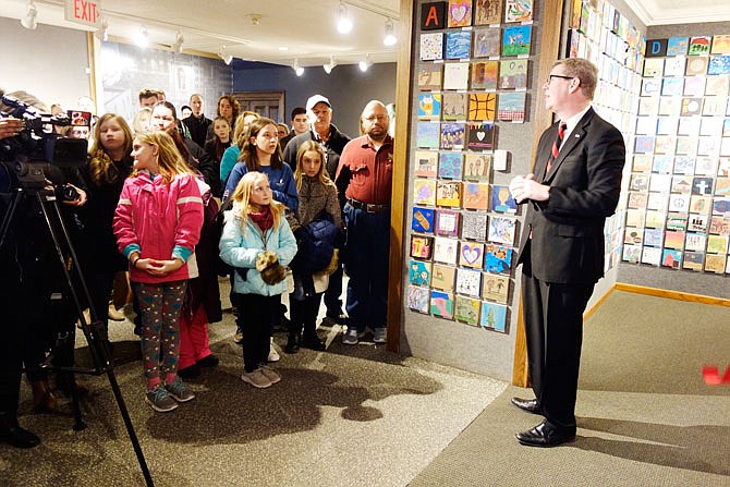 Tim Riley, director and chief curator of the National Churchill Museum, addresses the gathering Tuesday at the opening of the Special Relationship Project. This exhibition was created by more than 4,000 Callaway County school children and others, using a theme coined by Sir Winston Churchill 73 years ago.