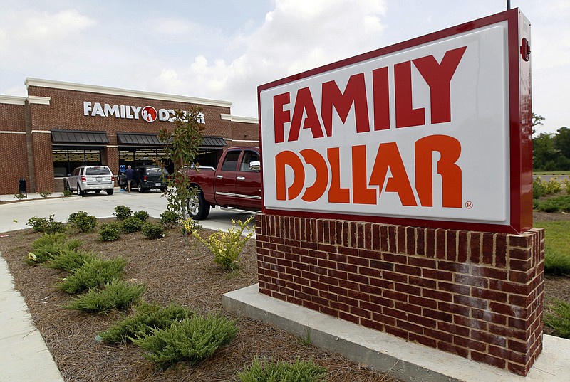 FILE - This Aug. 19, 2014 photo shows the Family Dollar store in Ridgeland, Miss. Dollar Tree is closing up to 390 Family Dollar stores this year and rebranding about 200 others under the Dollar Tree name. The company closed 84 Family Dollar stores in the fourth quarter, 37 more than originally planned. (AP Photo/Rogelio V. Solis, File)