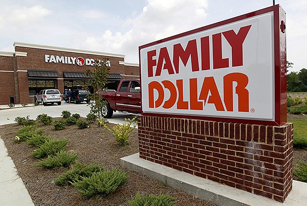 This Aug. 19, 2014, photo shows the Family Dollar store in Ridgeland, Miss. Dollar Tree is closing up to 390 Family Dollar stores this year and rebranding about 200 others under the Dollar Tree name. The company closed 84 Family Dollar stores in the fourth quarter, 37 more than originally planned. (AP Photo/Rogelio V. Solis, File)