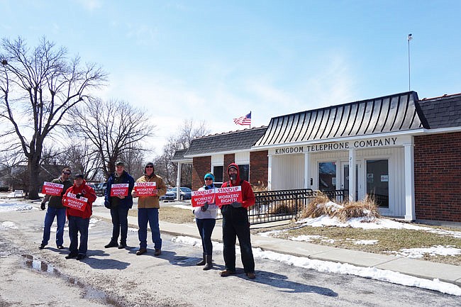 Members of Communication Workers of America protest Wednesday outside Kingdom Telephone Company in Auxvasse. Local 6311 President Darin Nelson said the latest round of contract negotiations have dragged on for five months.